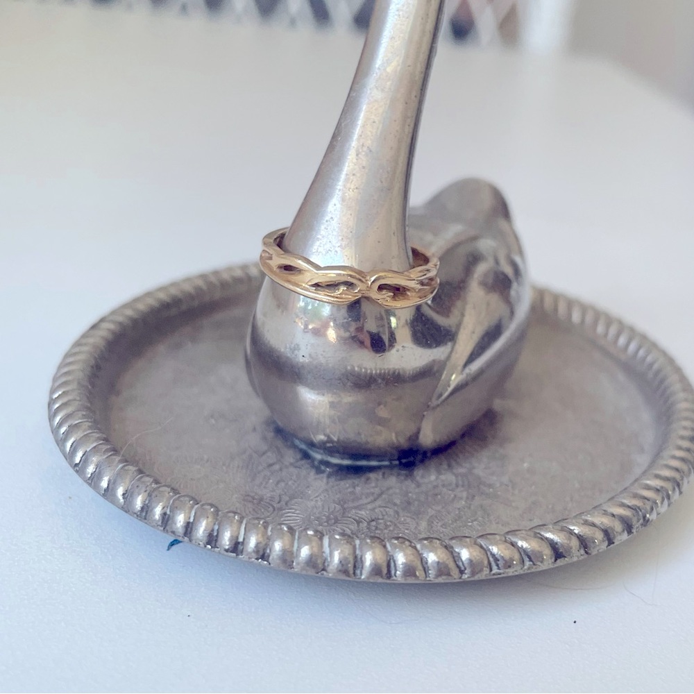 14k gold pinky ring.